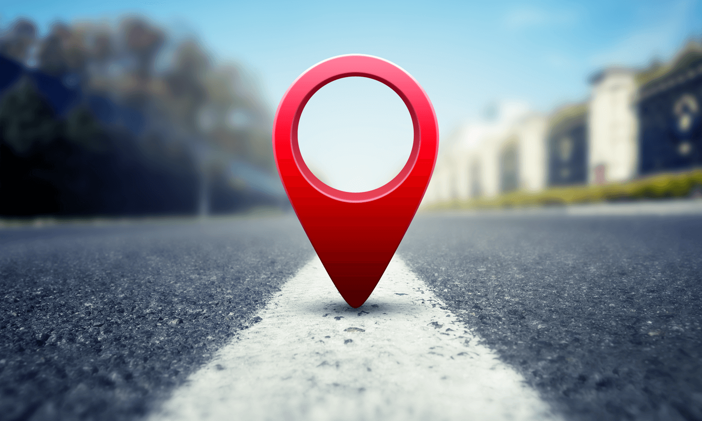 location symbol on the road