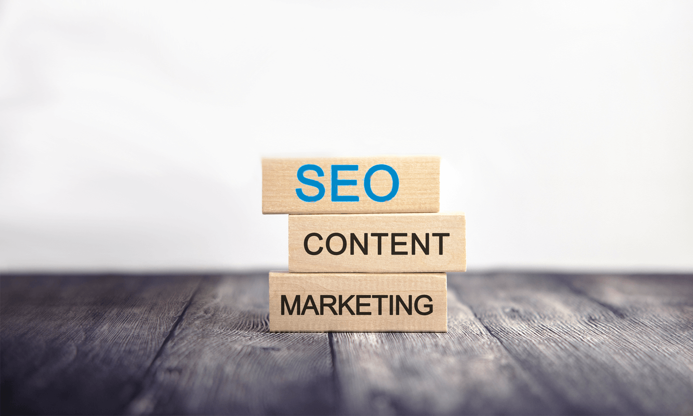 seo and content marketing words on wood block