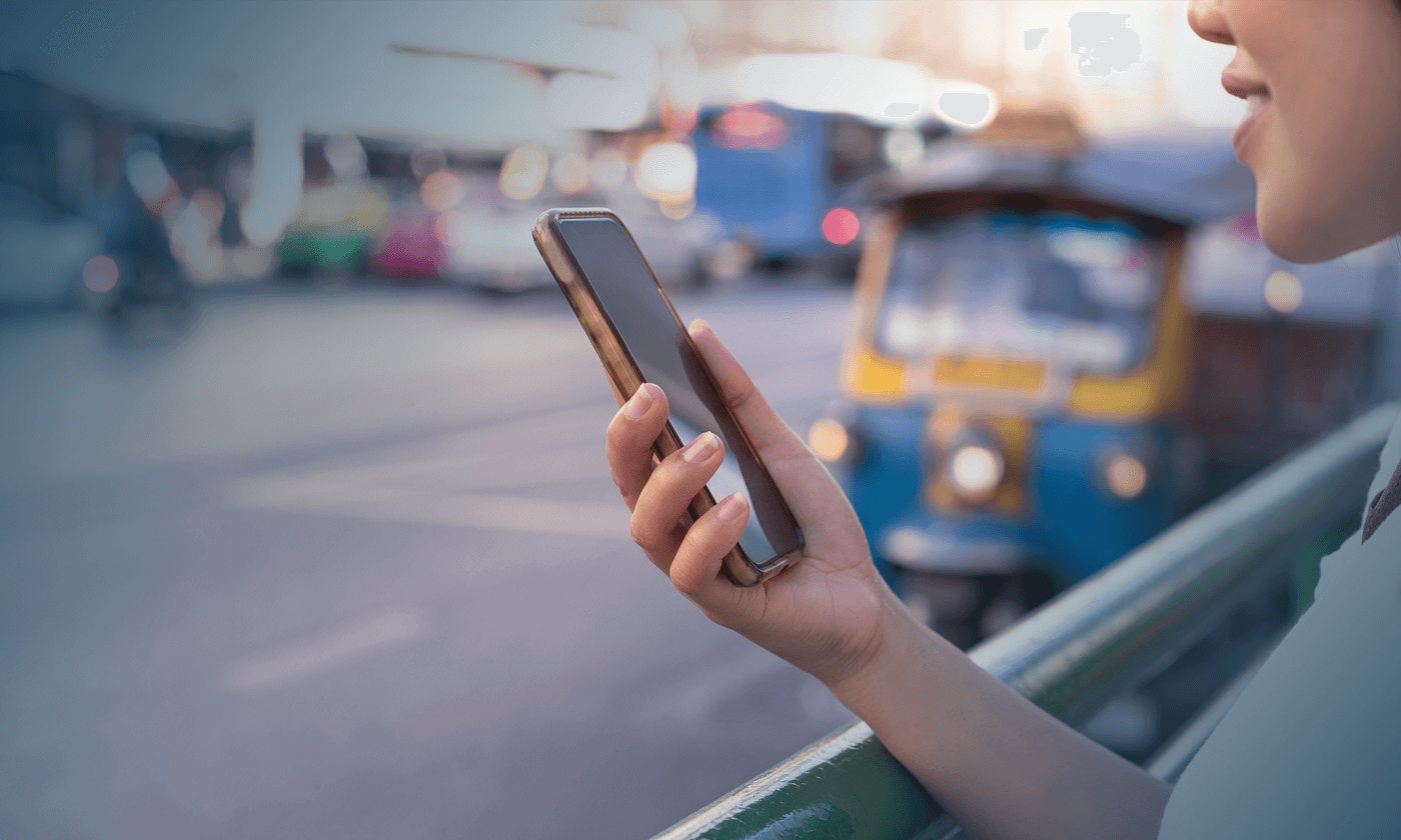 woman holing a smartphone