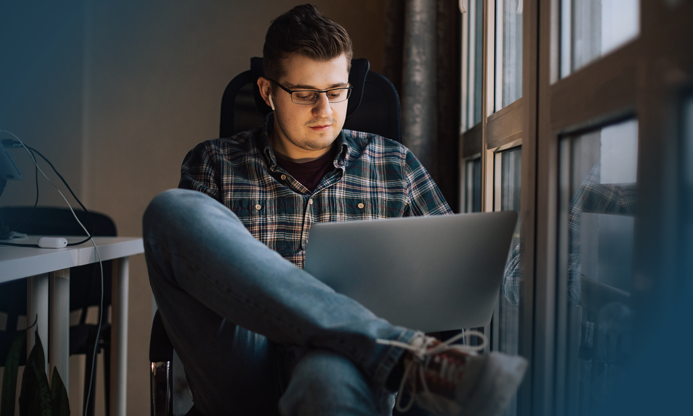 man using laptop