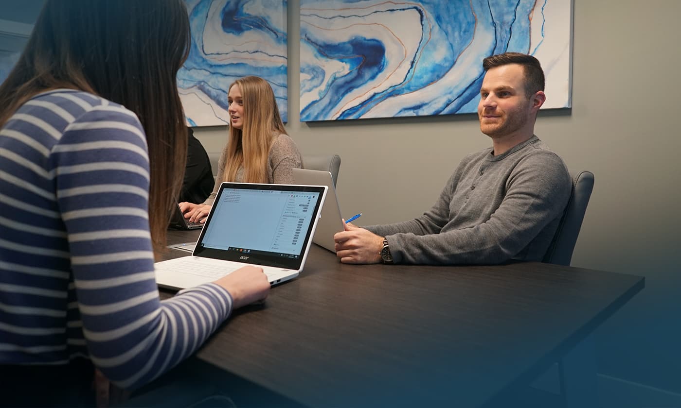 Big Leap employees in a meeting