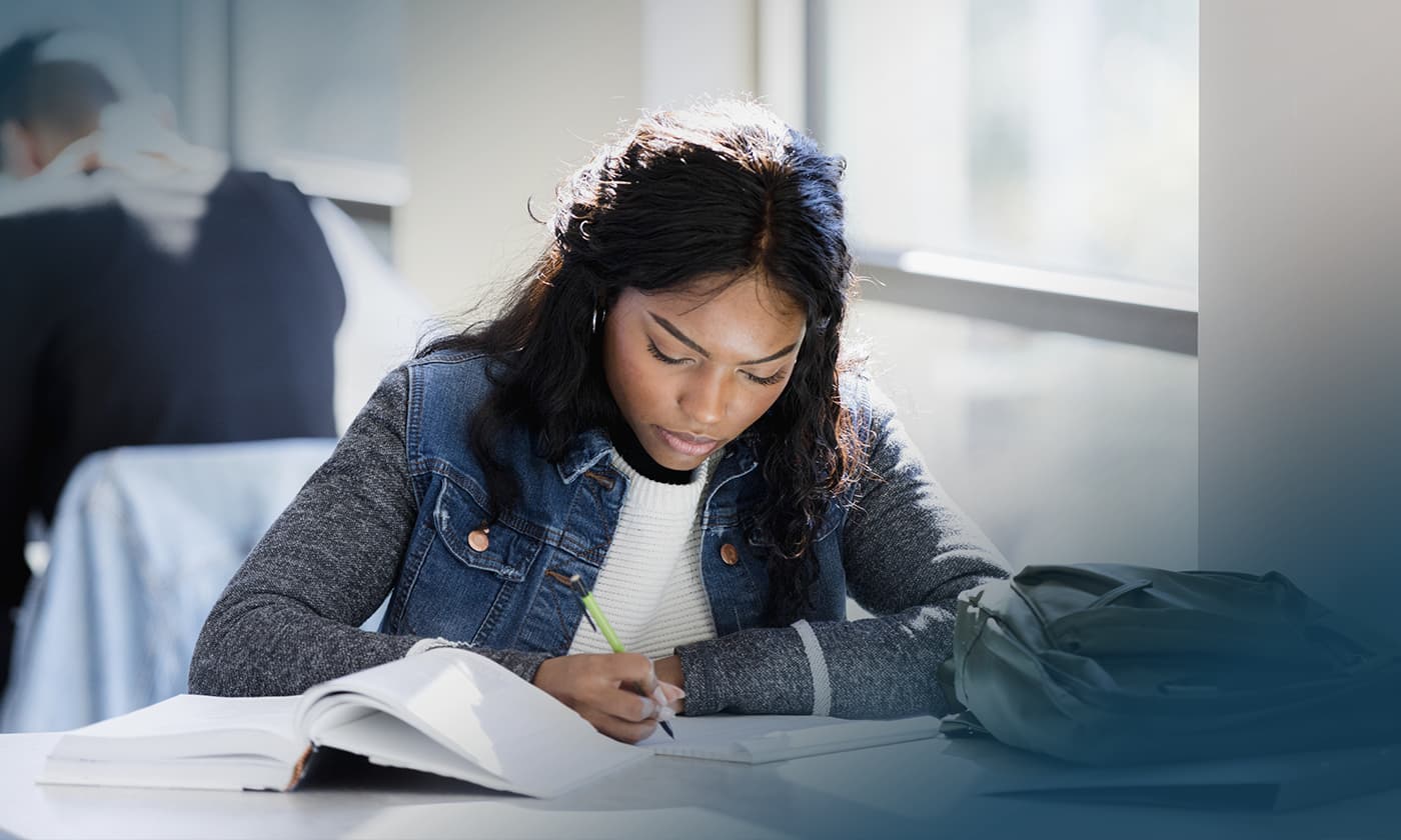 female college student doing homework
